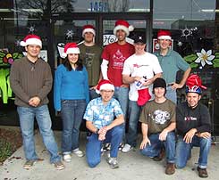 Chain Reaction Redwood City staff. Left to right, Roger, Emily, Don, Mike (kneeling), Todd, Josh (who bribed me to say he loves Janelle even more than riding a bike), Greg (kneeling), Chris & Bruno.