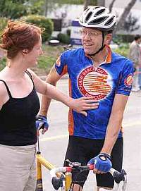 Mike talking to a Courtney at a race.